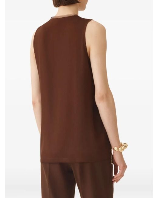 Top con apliques y cuello en V Fabiana Filippi de color Brown
