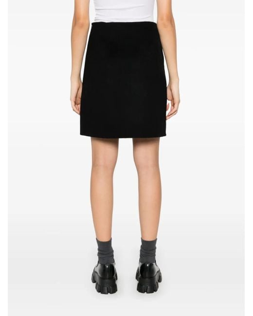 Falda corta lisa P.A.R.O.S.H. de color Black