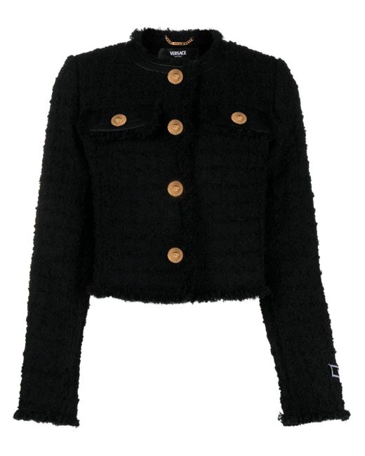 Veste crop en tweed à franges Versace en coloris Black
