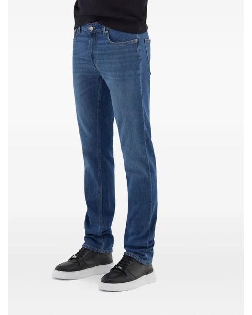 Roberto Cavalli Blue Logo-Appliqué Skinny-Cut Jeans for men