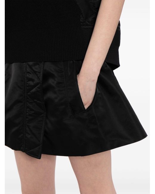 Jupe-short courte à taille haute Sacai en coloris Black