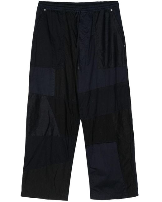Pantalones ajustados con diseño patchwork Comme des Garçons de hombre de color Blue