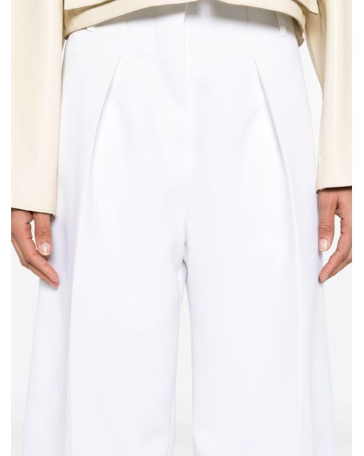 Pantalon palazzo Ovalo à plis Jacquemus en coloris White