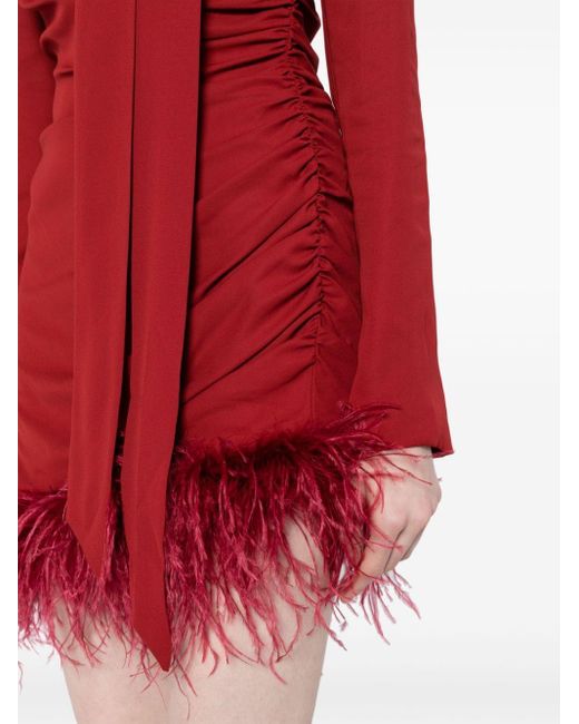 Robe courte à détail de plumes De La Vali en coloris Red