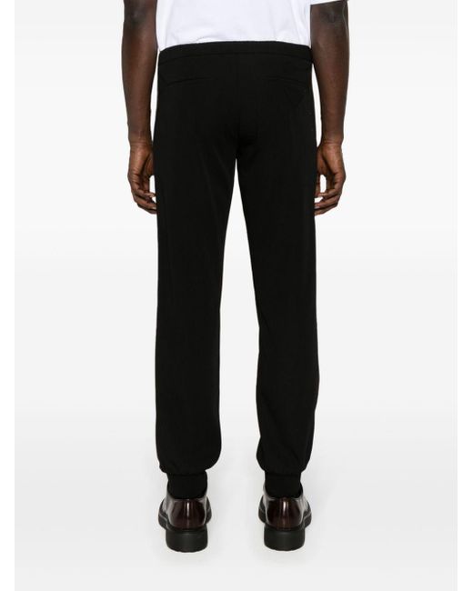 Pantalon fuselé à lien de resserrage Prada pour homme en coloris Black