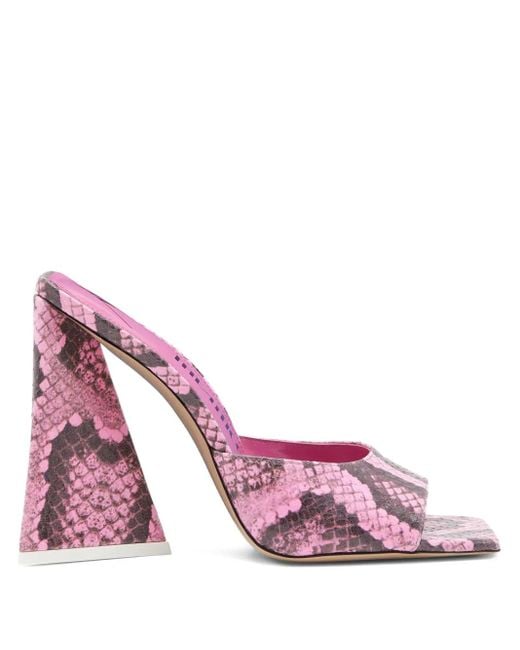 Mules con tacón de piel de serpiente The Attico de color Pink
