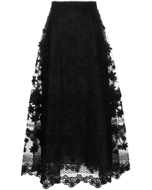 Jupe mi-longue à fleurs brodées Elie Saab en coloris Black