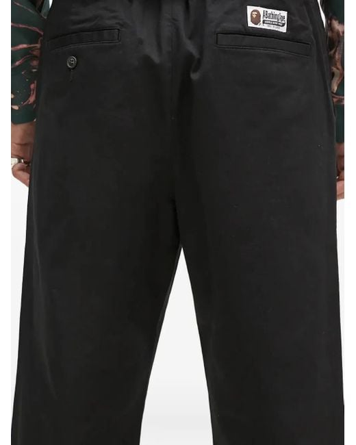 A Bathing Ape Black Logo-Appliqué Trousers for men
