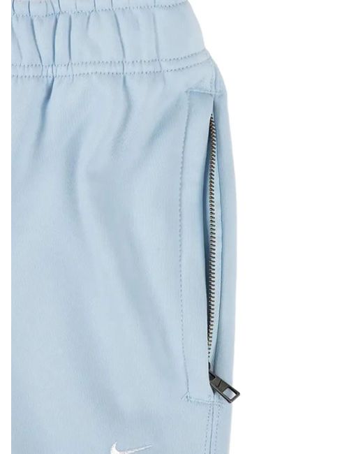 Nike Blue Cuffed Solo Swoosh Track Pants for men