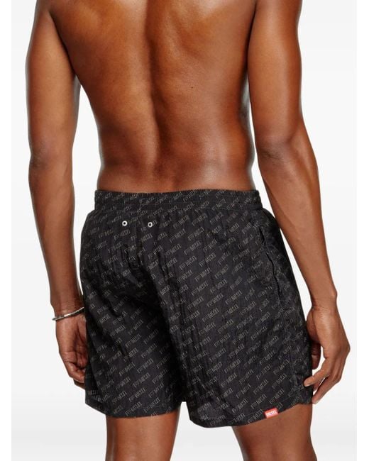 DIESEL Black Mid-Length Swim Shorts With All-Over Logo for men