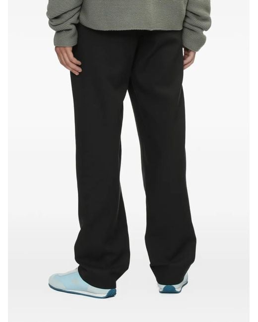 Rier Black Tourbe Rustic Fitted Virgin-Wool Trousers for men