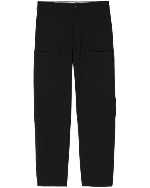 Pantaloni affusolati con design patchwork di Comme des Garçons in Black da Uomo