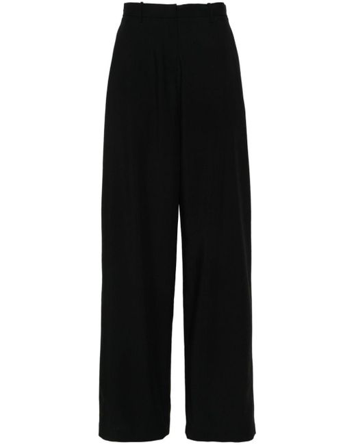 Wide-leg wool trousers Magda Butrym de color Black