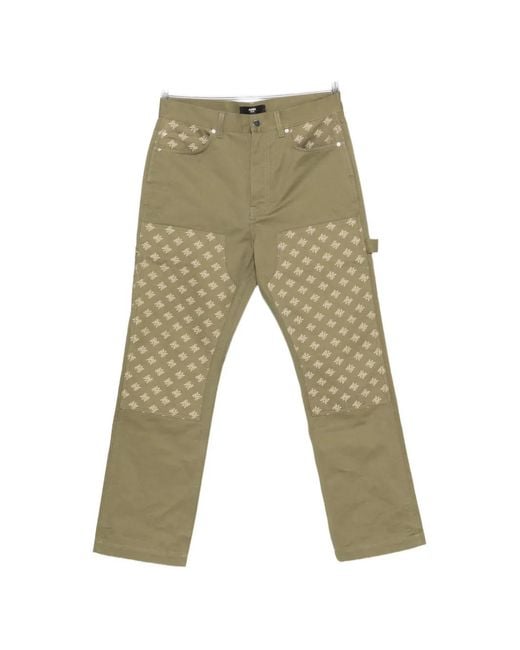 Amiri Green Monogram-Pattern Panelled Trousers for men