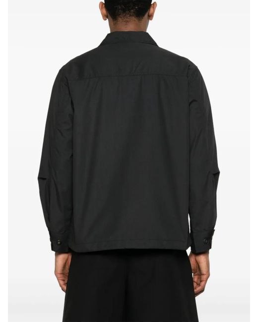Giacca Parachute Field di Universal Works in Black da Uomo