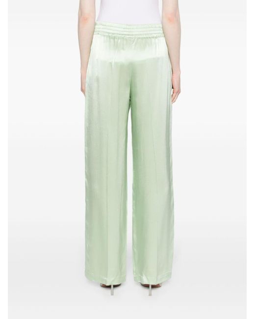 Pantalon en satin à coupe ample Victoria Beckham en coloris Green