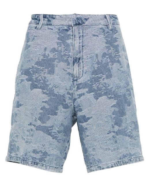Pantalones vaqueros cortos con motivo en jacquard Emporio Armani de hombre de color Blue
