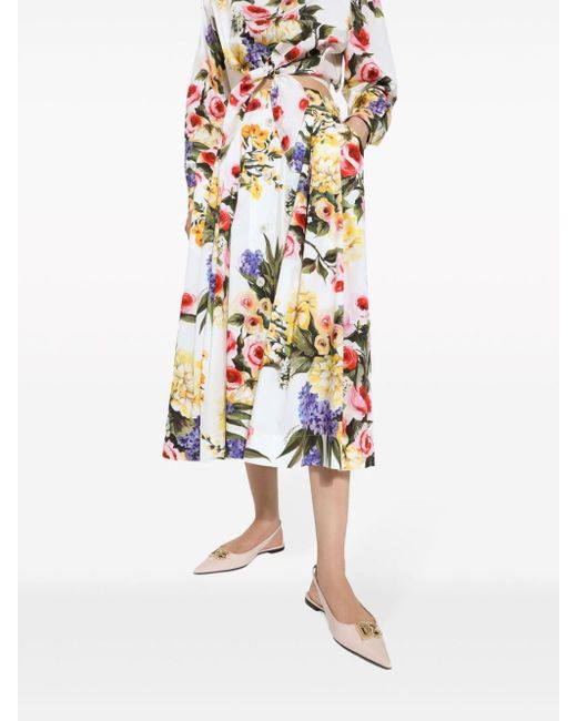 Jupe mi-longue à fleurs Dolce & Gabbana en coloris White
