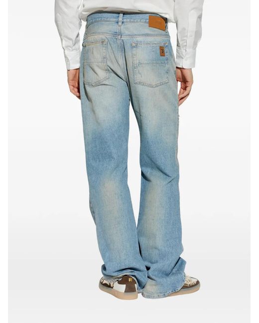 Amiri Blue Distressed Ripped Jeans for men
