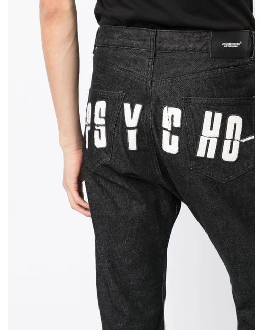 Undercover Black X Psycho Logo-Appliqué Jeans for men