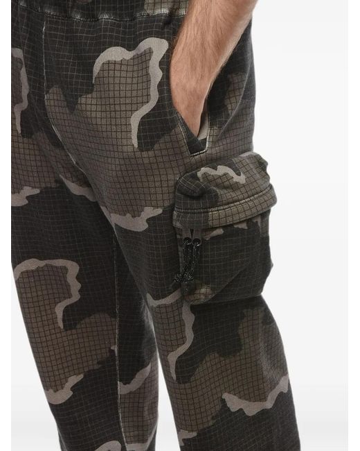 Undercover Black X Eastpak Camouflage-Print Cotton Track Pants for men
