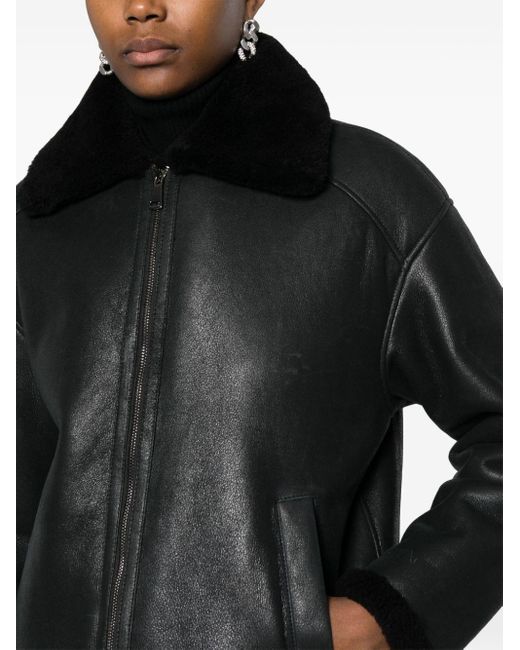 Shearling-trim leather jacket di Forte in Black