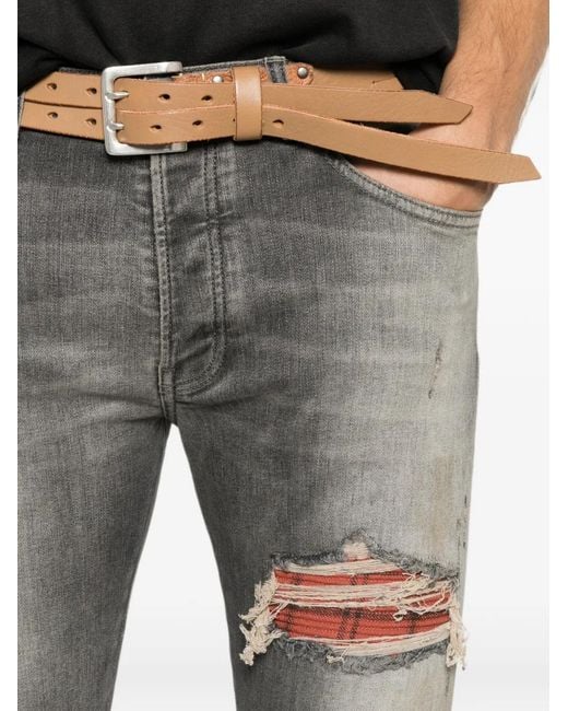 Amiri Gerafelde Jeans Met Patchwork in het Gray voor heren