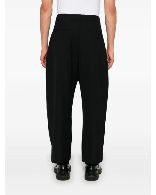 Studio Nicholson Black Tuck Trousers for men