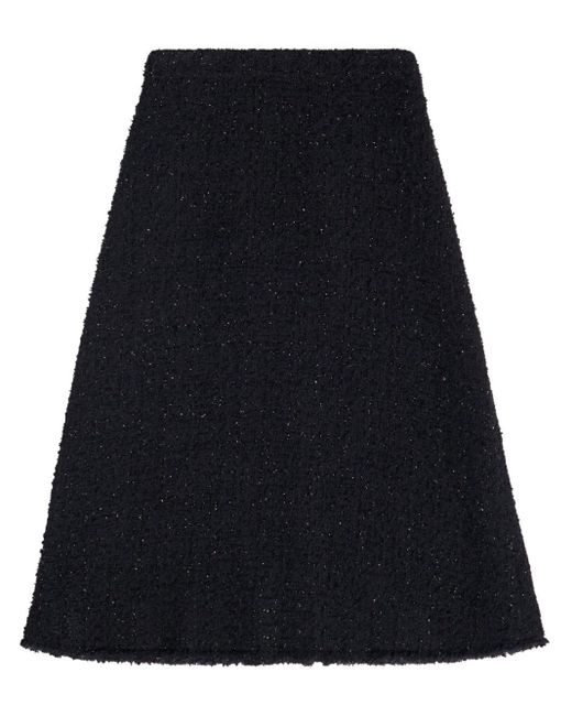Jupe en tweed à coupe évasée Balenciaga en coloris Black