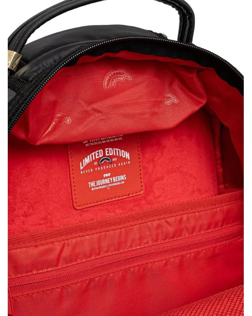 Mochila a cuadros con aplique de tiburón Sprayground de color Black