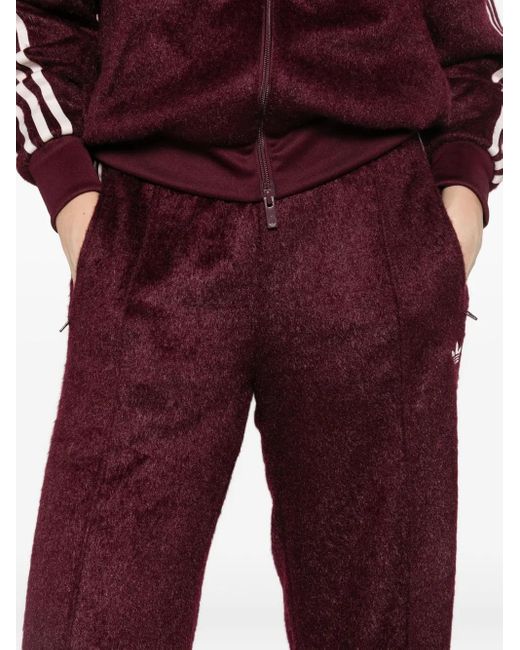 Pantalones de chándal con detalle del logo Adidas de color Red