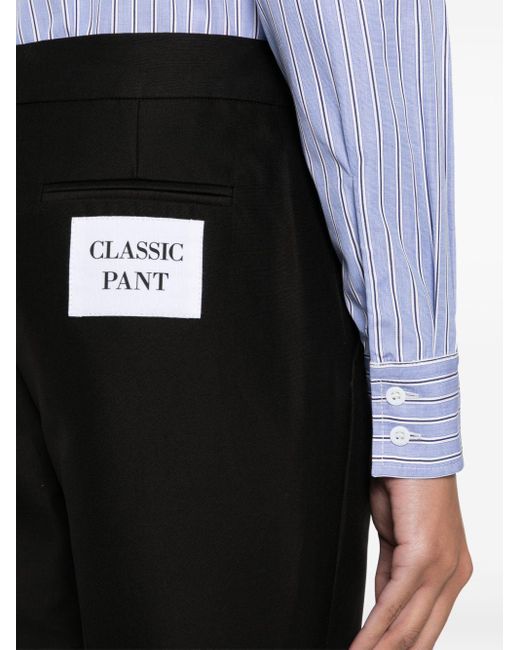 Pantalones con detalle de parche Moschino de color Black