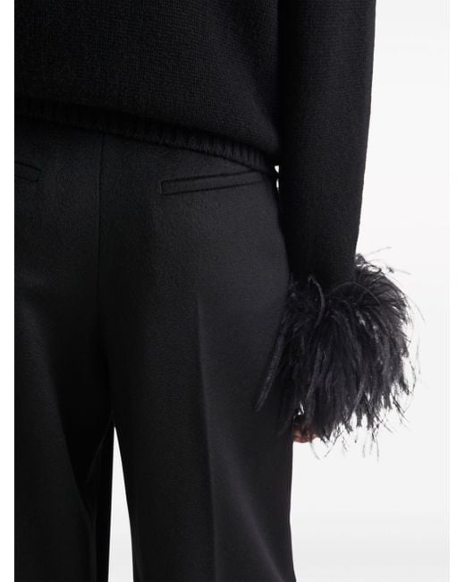 Pantalon de tailleur bordé de plumes Prada en coloris Black