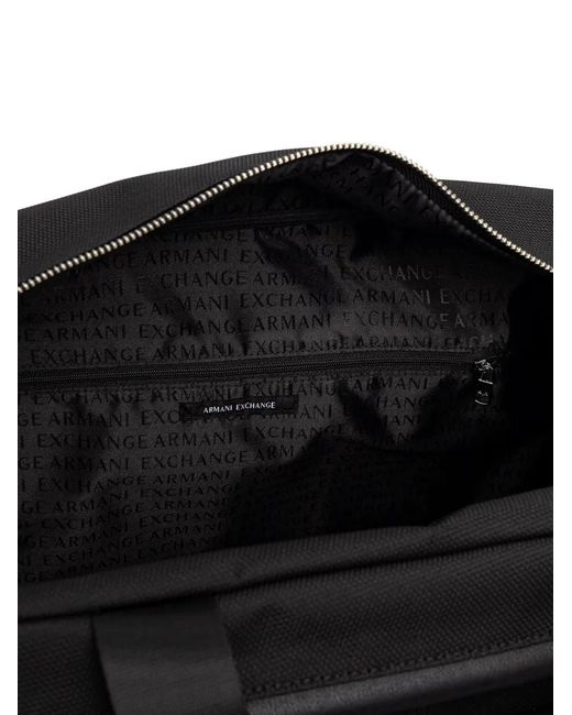 ARMANI EXCHANGE Black Logo-Print Strap Zip-Pocket Holdall for men
