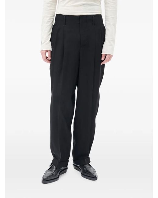 Ann Demeulemeester Black Agdar Pleated Tapered Trousers for men