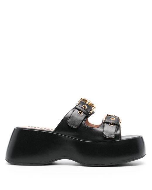 Sandalias con plataforma de 65 mm Moschino de color Black