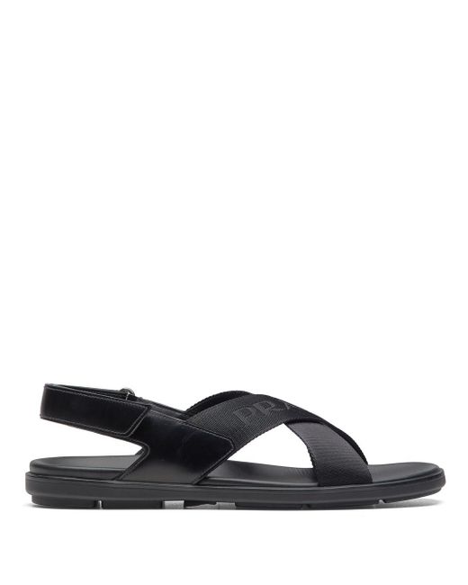 Sandalias con tiras cruzadas y logo Prada de Cuero de color Negro para  hombre | Lyst