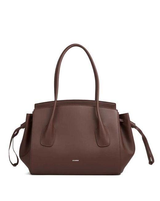 Jil Sander Brown Voyage Drawstring Leather Tote Bag