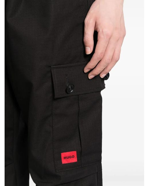 Pantalones cargo con aplique del logo HUGO de hombre de color Black
