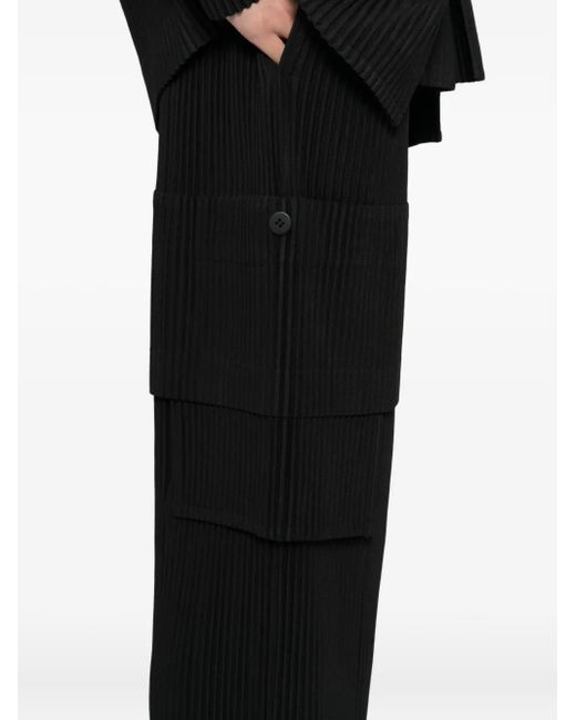 Homme Plissé Issey Miyake Black Multi-Pocket Trousers With Adjustable Waistband And Flap Pockets for men