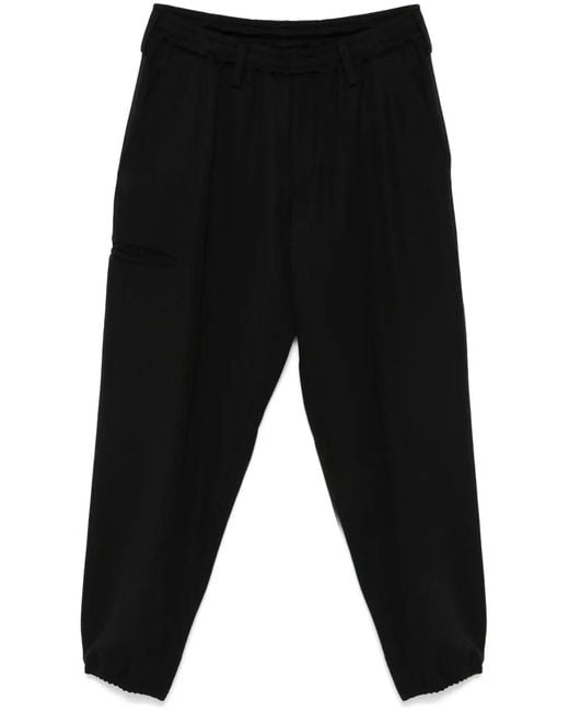 Yohji Yamamoto Black Elasticated Wool Tapered Pleated Trousers for men