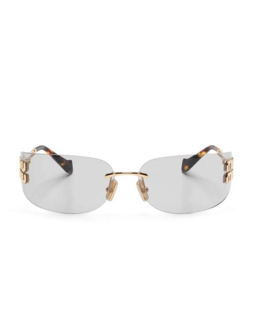 Gafas de sol con placa del logo Miu Miu de color Metallic