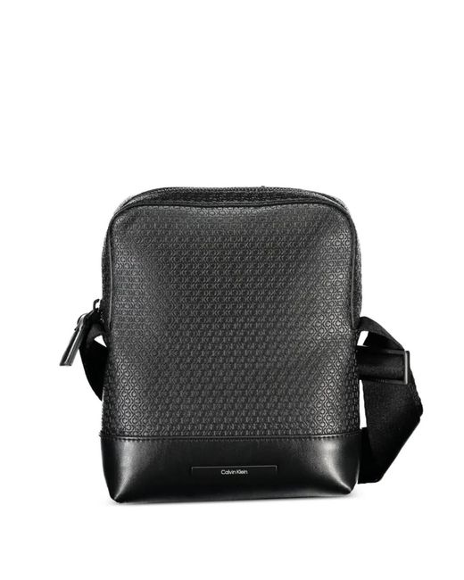 Calvin Klein Black Monogram-Embossed Shoulder Bag for men