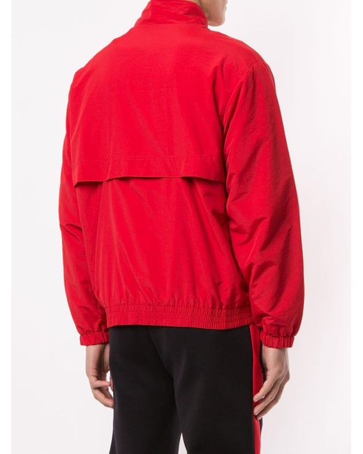 supreme classic logo taping track jacket red