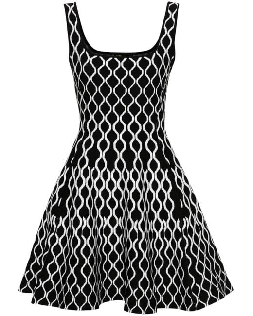 Robe Courte Évasée À Motif En Jacquard Maje en coloris Black
