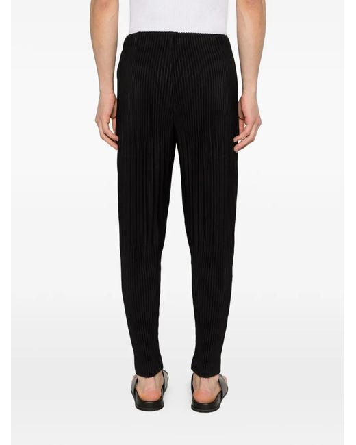 Homme Plissé Issey Miyake Black Pleated Trousers for men