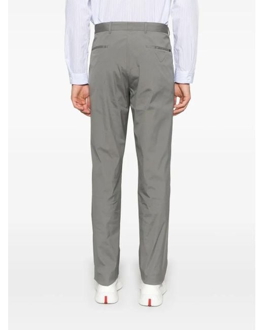 Prada Gray Triangle-Logo Trousers for men