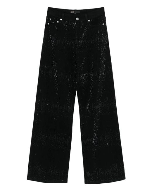 Vaqueros con detalles Maje de color Black