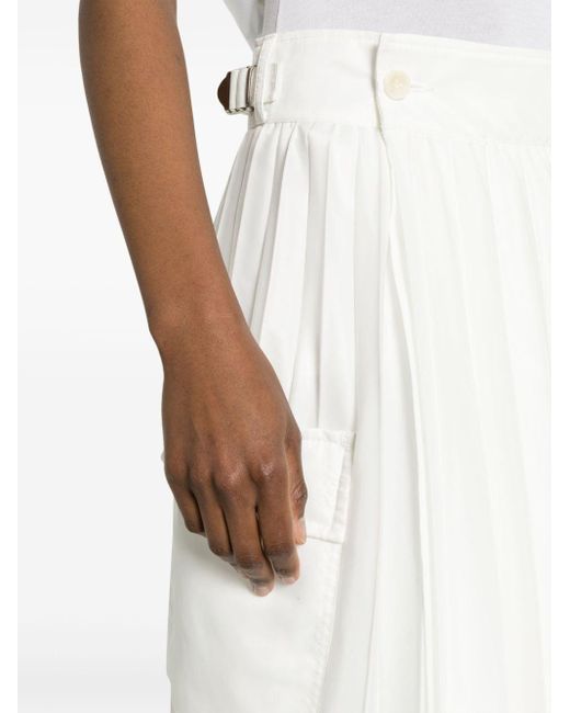 Jupe mi-longue plissée à poches cargo Sacai en coloris White
