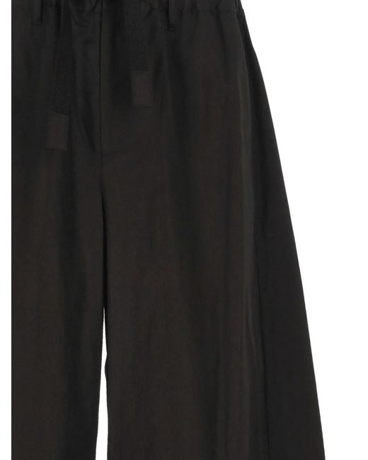 Sacai Black Drawstring-Cuff Trousers for men